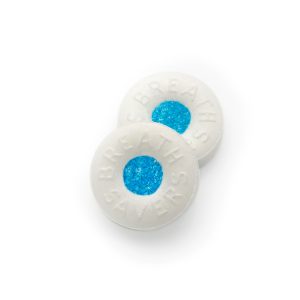 Two Peppermint Breath Saver Tablets on white background